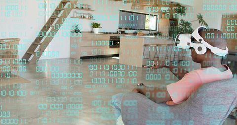 Man Wearing White VR Headset Relaxing in Modern Living Room Exploring Virtual Reality