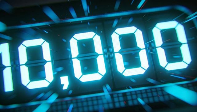 Glowing cyan seven-segment display showing 10,000 led readout with neon sparks, futuristic glow
