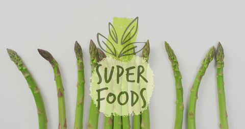 Fresh asparagus stalks with super foods label
