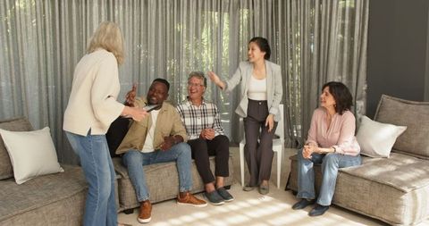 Celebratory Moment in Group Therapy Discussion