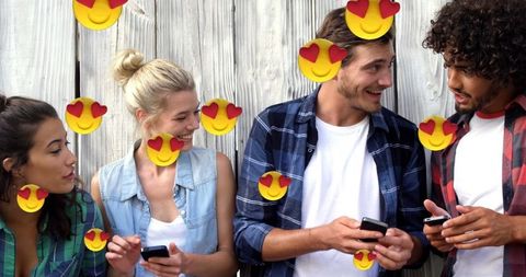 Group of friends excitedly engaging on social media
