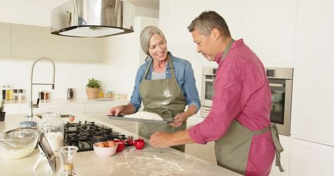 Senior Couple Engaging in Baking Together Offering Culinary Delight