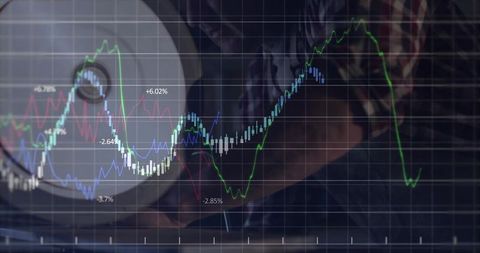 Man Tracking Financial Analysis on Laptop in Modern Home Office