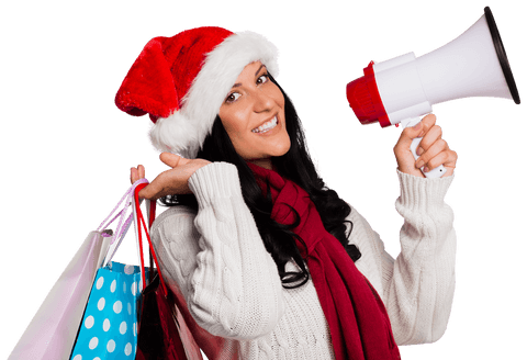 Cheerful woman in santa hat holding christmas shopping bags with megaphone