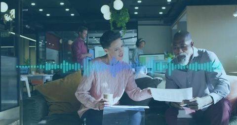 Professionals discussing documents with soundwave overlay in modern office