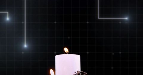 White pillar candles with pinecones glowing against dark tech grid backdrop, minimalist ambient