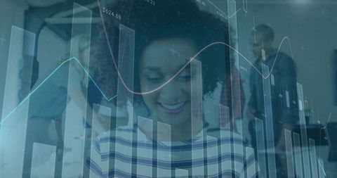 Smiling Professional Analyzing Data Visualization in Modern Office