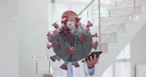 Senior Doctor Using Tablet Surrounded by Digital COVID-19 Graphics