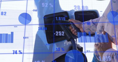 Data Overlay Showing Woman Fueling Electric Vehicle