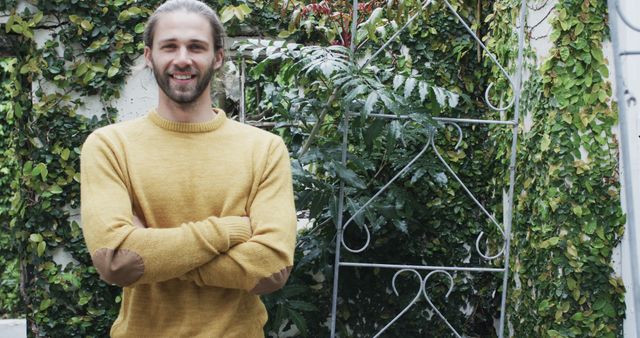 Smiling Man with Long Hair Standing in Garden - Download Free Stock Images Pikwizard.com