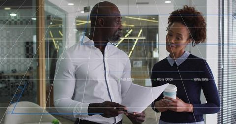 Professionals Discussing Reports with Digital Overlay in Modern Office