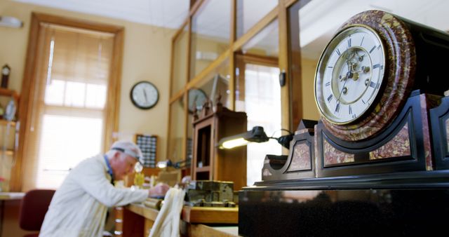 Antique Clockmaker Repairing Vintage Timepiece in Workshop - Download Free Stock Images Pikwizard.com