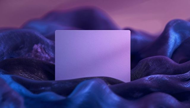 Dramatic purple panel among draped blue fabric