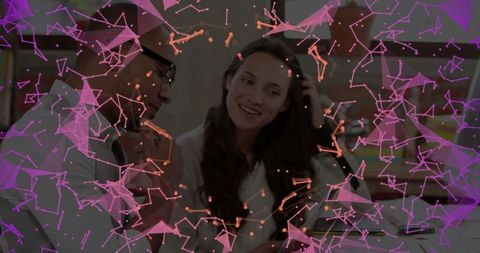 Teamwork in Modern Office with Data Visualization Overlay