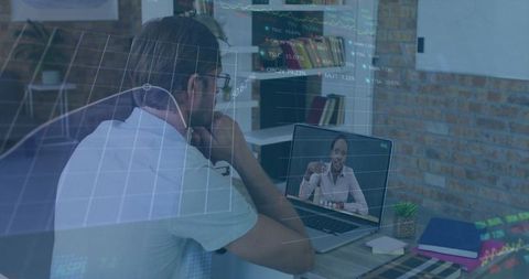 Man engaging in online business meeting with stock data overlay