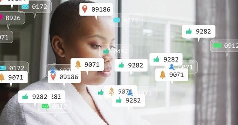 Woman overwhelmed by social media notifications at home window