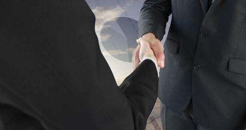 Businessmen Handshake with Graphs and Statistics Overlay - Download Free Stock Images Pikwizard.com