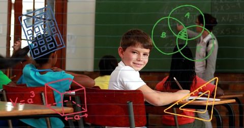 Happy Schoolboy Learning Mathematics Concept in Classroom