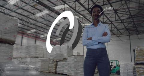 Warehouse supervisor standing with arms crossed overseeing logistics with 3d overlay