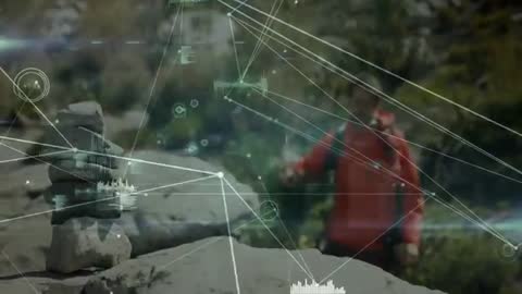 Hiker Using Augmented Reality for Cairn Stabilization on Adventure Trail