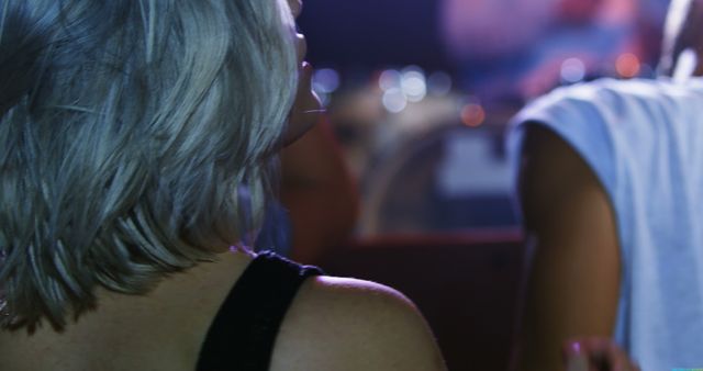 Woman with Silver Hair Enjoying Concert Atmosphere - Download Free Stock Images Pikwizard.com