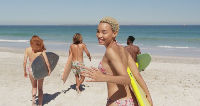 Group of Friends Enjoying Surfing at Beach on Sunny Day - Download Free Stock Images Pikwizard.com