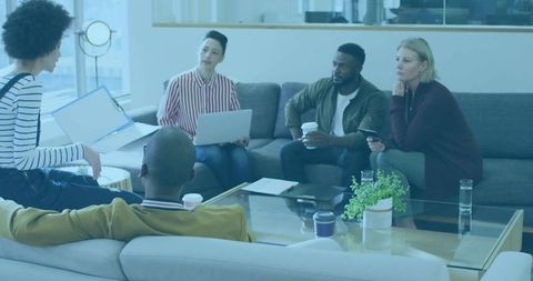 Team Meeting and Collaboration in Modern Workspace