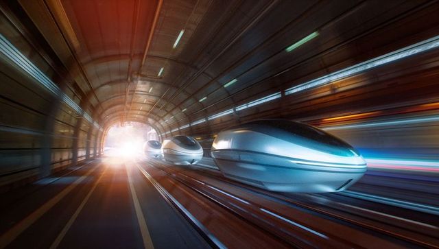 Futuristic Maglev Pods Racing in High-Tech Tunnel