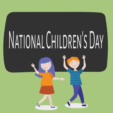 National Children's Day Celebration with Happy Kids and Chalkboard