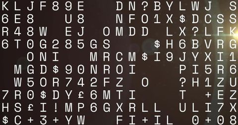 Glowing monospaced alphanumeric grid displaying futuristic code with bokeh light flare