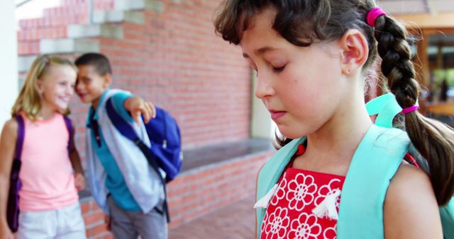 Schoolkid bullying a sad girl in corridor at school 4k