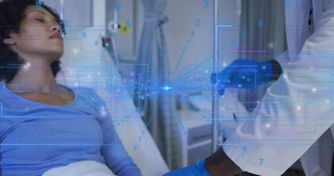 Doctor Holding Patient Hand Reviewing Digital Health Data Overlay at Hospital Bedside