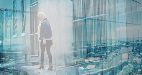 Asian Woman in Hijab Overlaid on Urban Cityscape