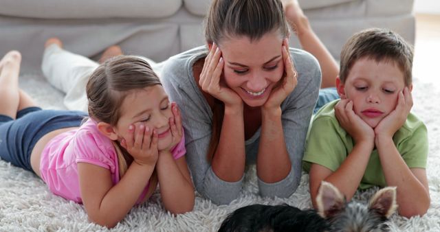 Mother with Children Lying on Carpet with Pet Dog, Enjoying Family Time - Download Free Stock Images Pikwizard.com