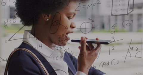 African American Businesswoman Using Smartphone with Mathematical Overlay - Download Free Stock Images Pikwizard.com