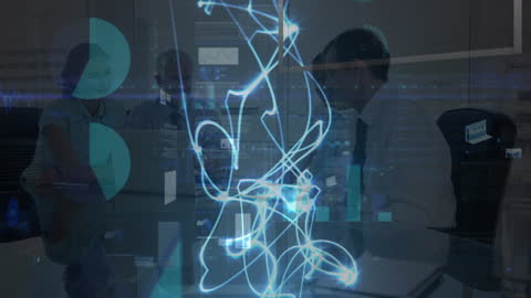 Diverse Business Team in Office with Data Visualizations