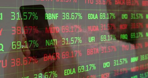 Businessman Holding Smartphone Viewing Transparent Stock Market Panel