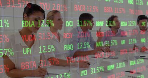 Business Team Analyzing Stock Market Data Projected on Wall