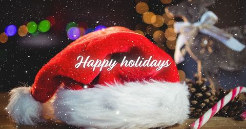 Festive Christmas Decor with Santa Hat and Snowflakes Greeting