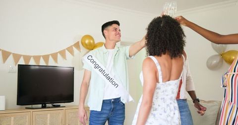 Friends Celebrating Success with Home Toast and Joyful Laughter
