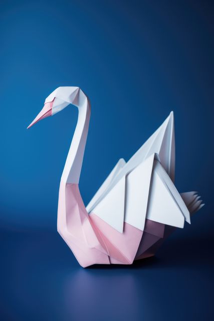 Close up of origami figure of swan on blue background, created using generative ai technology. Origami, art and japanese tradition concept digitally generated image.