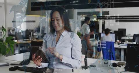Woman Using Tablet with Holographic Network Map Overlay