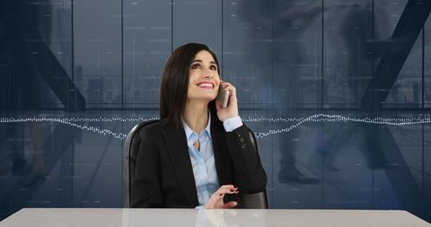 Businesswoman Talking on Phone in Modern Corporate Office - Download Free Stock Images Pikwizard.com