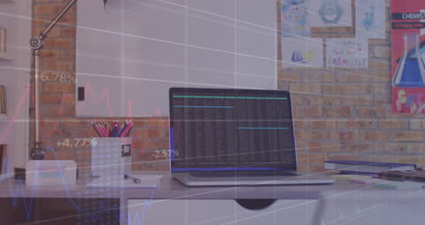 Financial Analysis on Laptop in Office Setting with Graph Overlay