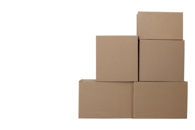 Stack of cardboard boxes against white background