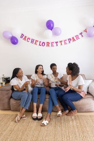Diverse friends enjoying casual bachelorette party celebration
