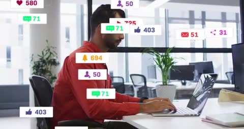 Office Worker Managing Social Media Engagements and Analytics