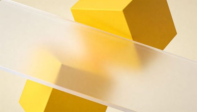 Bisecting frosted panel blurring yellow cubes minimalist diagonal geometry composition