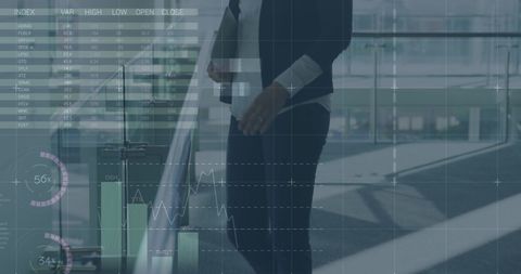 Businesswoman Analyzing Financial Data with Digital Tablet Interface