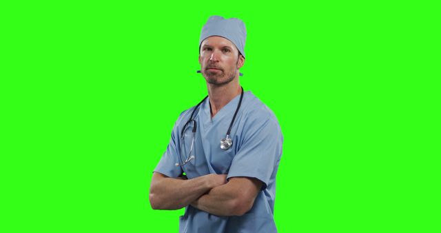 Confident Male Doctor In Scrubs With Stethoscope Against Green Screen - Download Free Stock Images Pikwizard.com